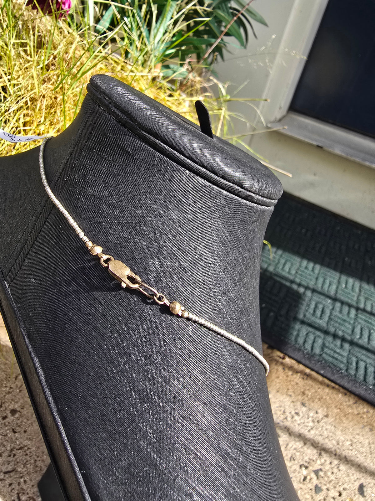 Antique crane intaglio made from stunning black glass on long metallic bead and black glass chain